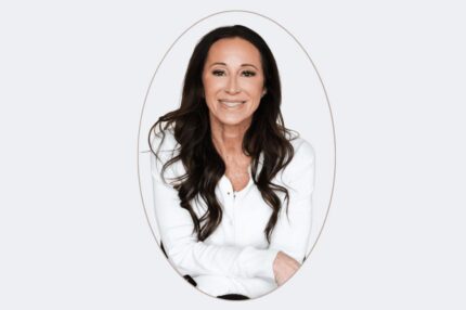 Smiling medical provider portrait in white top